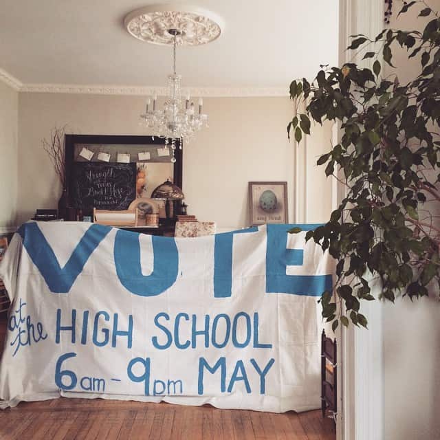 How do I get myself roped into these things? Lessons learned: lettering on a drop cloth is tricky, but cost effective; these things always take longer than you'd expect; everything will look cuter when you add Kindergarteners' handprints.